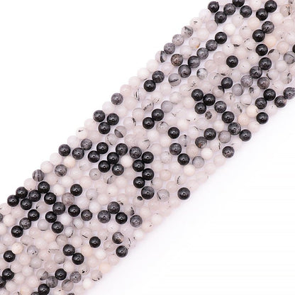 Fil quartz avec inclusions de tourmaline Brésil GRADE A - La Boite à Cailloux
