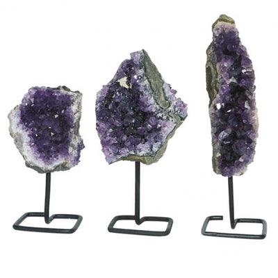 Fragment of raw amethyst from Brazil on metal support