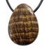 Pendentif aragonite beige Pérou (pierre trouée) + cordon - La Boite à Cailloux