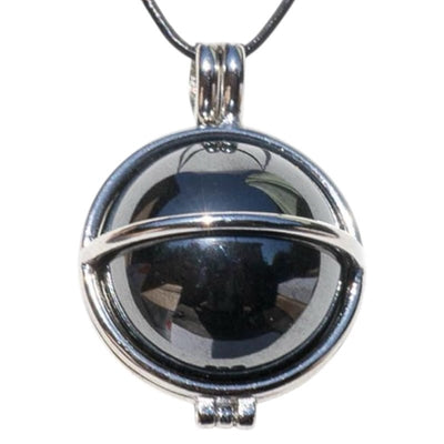 Pendentif boule hématite Brésil A dans cage