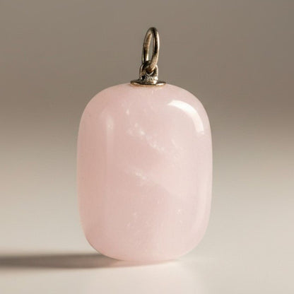 Pendentif manganocalcite Pérou A (pierre roulée) - La Boite à Cailloux