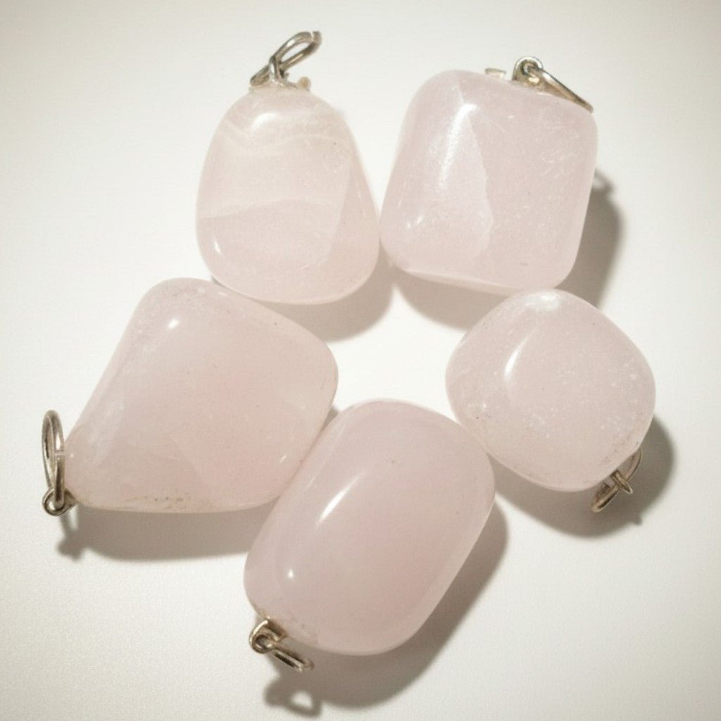 Pendentif manganocalcite Pérou A (pierre roulée) - La Boite à Cailloux