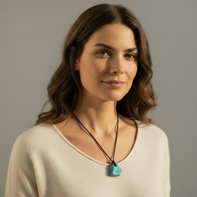 Tibet A stabilized turquoise pendant (holey stone) + cord