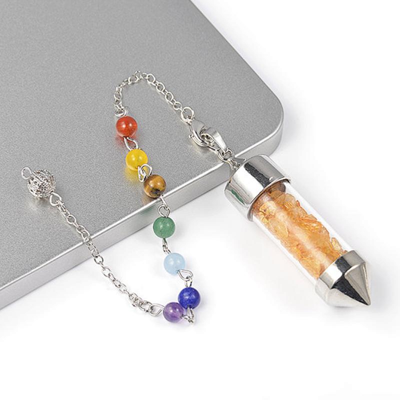 Pendule 7 chakras acier citrine chauffée Brésil - La Boite à Cailloux