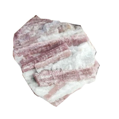 Pink tourmaline (rubelite) on Brazil A quartz (raw stone)